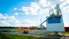The new rail line and wood pellet loading bay with sawmill residues in view at Drax LaSalle BioEnergy. Image Drax